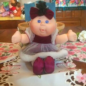 Cabbage patch kids girl black hair blue eyes